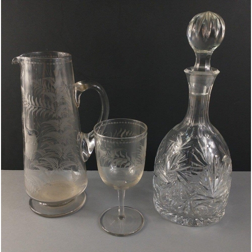 195 - A very nice bell shaped star based decanter with stopper.  Comes with an attractive glass fern patte... 