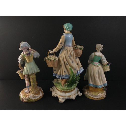 209 - Three MEISSEN figurines including a girl with flower baskets approx 33cm tall, a woman with bunches ... 