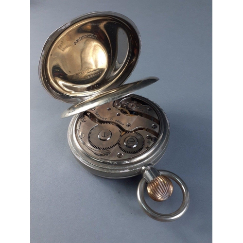 25 - A large Goliath size 8 Day pocket watch in working condition.  Lid stamped Argentum Swiss Made 13850... 