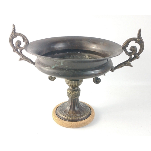 35 - A shallow two-handled brass fruit dish on a pedestal standing approx 20cm tall, dia 21cm approx#42... 