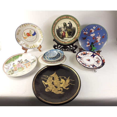 516 - A mixed box of decorative china including Thai and Chinese, some with display stands#529