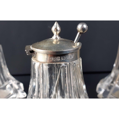 61 - A silver hallmarked cruet set, the pepper and mustard both marked for Chester 1939 made by James Dix... 