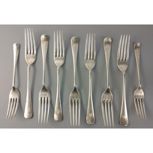 68 - A set of nine silver forks comprising seven 20cm forks for Sheffield 1923.  The smaller with matchin... 