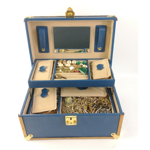 79 - A blue jewellery case, clasp not working, 27x18x14cm, containing costume jewellery to include earrin... 