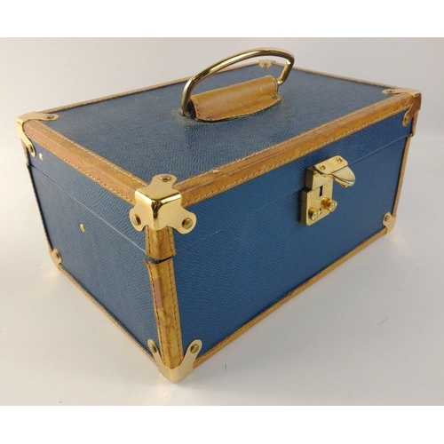 79 - A blue jewellery case, clasp not working, 27x18x14cm, containing costume jewellery to include earrin... 