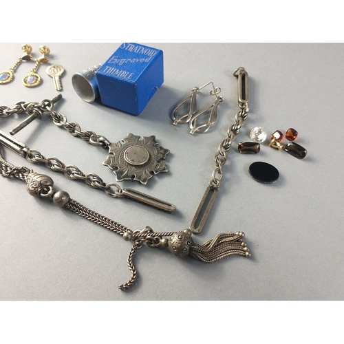 81 - A small bag of white metal jewellery to include 2 part chains, a STRATNOID thimble, and 2 pairs of e... 