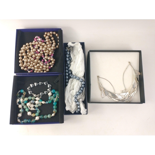 83 - A boxed MUSEUM SELECTION beaded necklace approx 86cm long with a heart-shaped bracelet, also a boxed... 