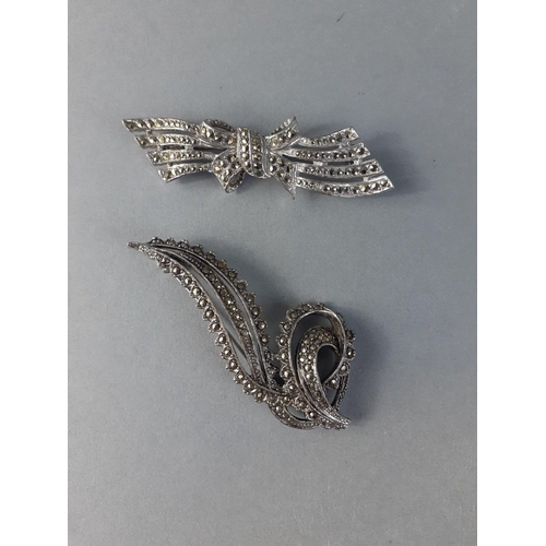 88 - Two very pretty MARCASITE brooches.  One ribbon shaped and one like a birds wing.  No missing stones... 