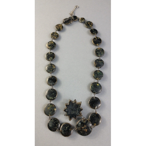 89 - A small size black stone, possible Jet necklace with drop earrings. 925 stamp to safety chain and 'N... 