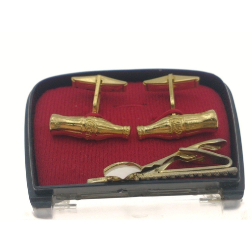 90B - CUTE! - A pair of COCA COLA yellow metal cufflinks still in their original case with also a yellow m... 