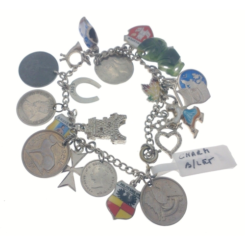 95 - Silver charm bracelet with Victorian silver coins attached and others. Total gross weight 30g approx... 