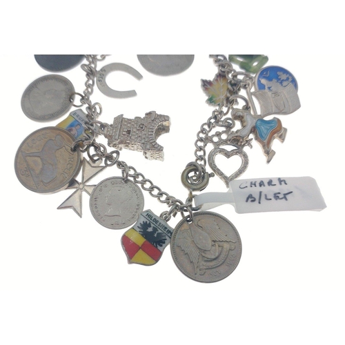 95 - Silver charm bracelet with Victorian silver coins attached and others. Total gross weight 30g approx... 