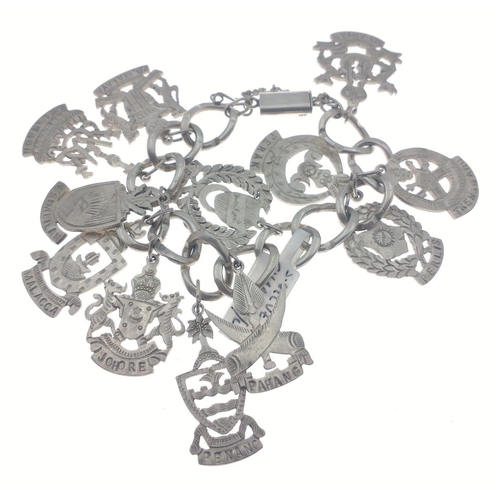 99 - Silver charm bracelet with continental fobs. Total gross weight 63.5g approx#108