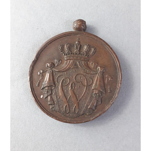 119 - A Wilhelm I Dutch long service VOOR TOUREEN DIENST (For Faithful Service) medal, a circular bronze m... 