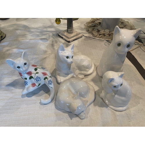 221 - MEEOW! A collection of 5 white ceramic PUSSYCATS with one floral cat - tallest cat 30cm tall approx#... 