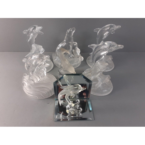 230 - A selection of seven CRISTAL D'ARQUES lead crystal dolphins and seal, tallest 17cm#67