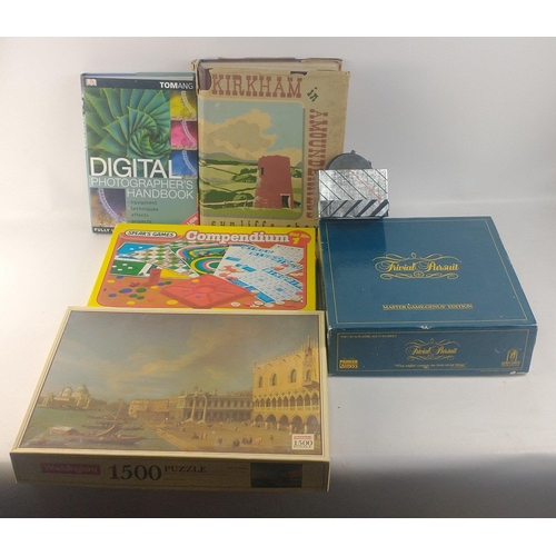 260 - PERFECT FOR WINTER EVENINGS! A 1500-piece jigsaw, a games compendium, Trivial Pursuit and other item... 