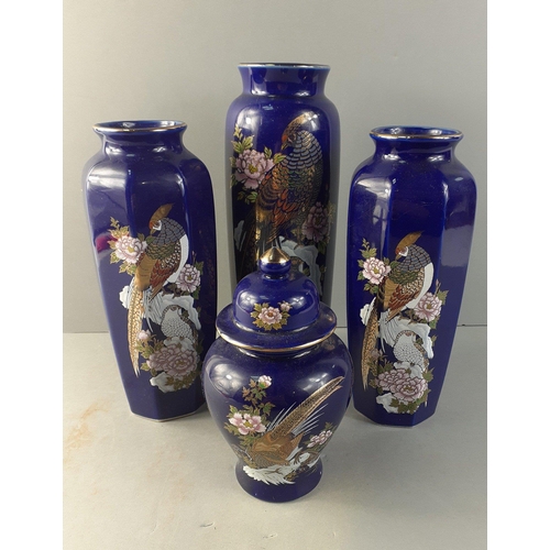 266 - A small collection of five Oriental cobalt blue pheasant vases to include two matching 21cm vases, a... 