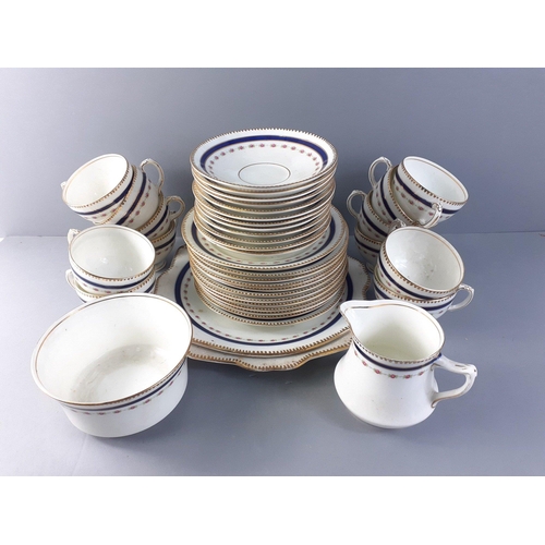 288 - A DIAMOND CHINA tea service for 12 comprising 12 each of teacups, saucers, side plates, 2 cake plate... 