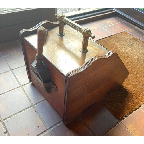 431 - A NICE EXAMPLE of an EDWARDIAN OAK and brass fireside coal purdonium complete with small coal shovel... 