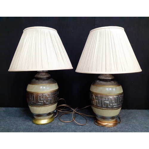 456 - A pair of large decorative ceramic table lamps with adjustable shade height holders measuring to the... 