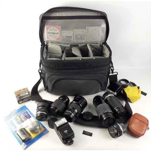 142 - A padded LOWEPRO camera bag full of camera lenses to include a SIGMA zoom 1:4-5.6 f=28-200mm, a VIVI... 