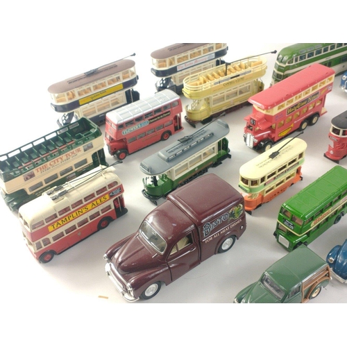 184 - A box of Diecast models to include many CORGI buses and trams as well as some Lledo models.#198