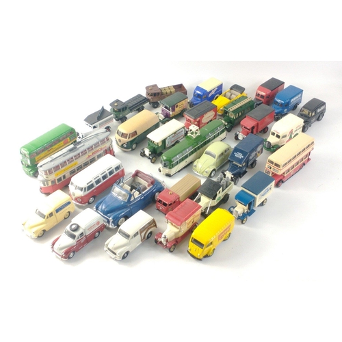 184 - A box of Diecast models to include many CORGI buses and trams as well as some Lledo models.#198