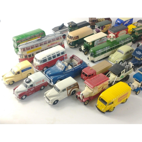 184 - A box of Diecast models to include many CORGI buses and trams as well as some Lledo models.#198