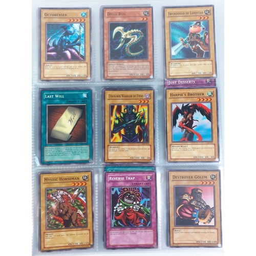 187 - A folder of KONAMI YU-GI-OH! trading cards includes 38 sheets each of 9 cards#201