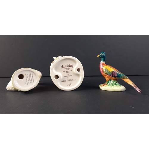 199 - Two pieces of BESWICK ceramics the first being a 1981 copyrighted REBECCAH PUDDLE DUCK standing appr... 