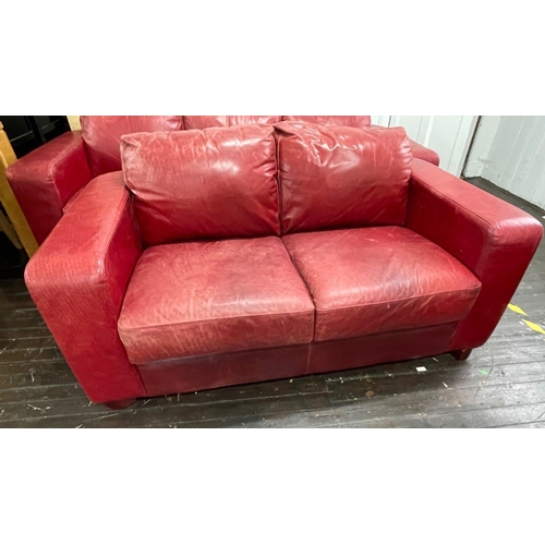 290 - A stylish RED LEATHER/HIDE  4 piece suite to include a 3 seater couch, a 2 seater couch and a really... 