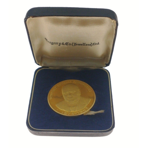 38 - A 1965 Churchill medallion with full hallmarks to the edge for Gregory & Co Ltd, 22 carat gold c... 