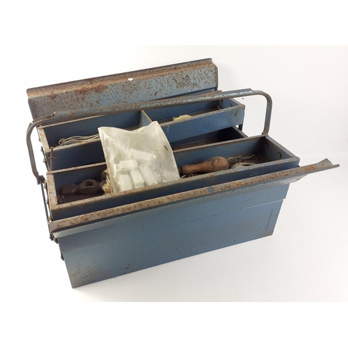 435 - A well used expanding metal tool box with contents which include various hammers, wrench, measures e... 