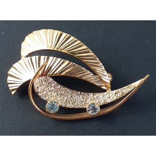 44 - A small collection of quality heavy gold plated costume jewellery to include MONET stamped brooch an... 