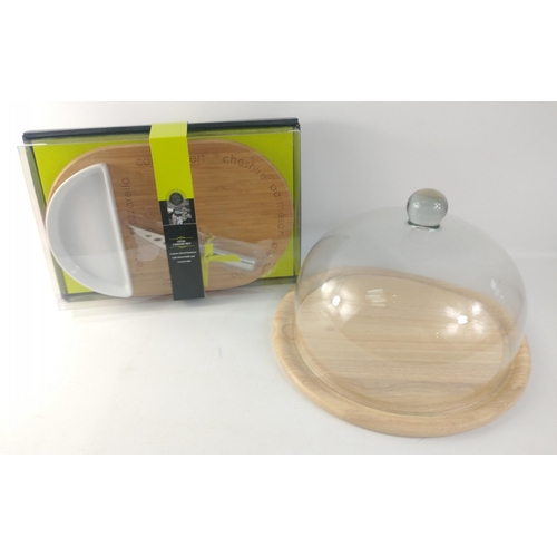 448 - A WILLIAMS & GREEN unopened oval cheese set comprising a cheese board with cheese knife and cera... 