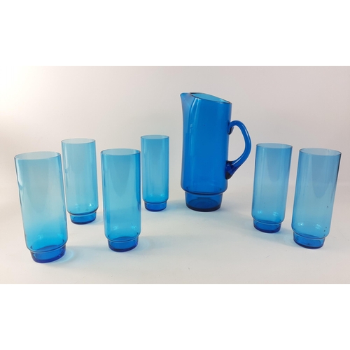 451 - A blue glass water set consisting of 6 hi-ball glasses and a large jug standing 25cm high.  No damag... 