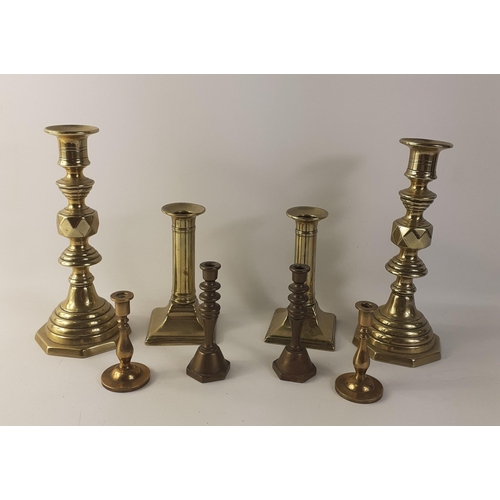 68 - A collection of 4 pairs of ANTIQUE brass CANDLESTICKS - tallest 20cm - smallest 8cm tall approx#82... 