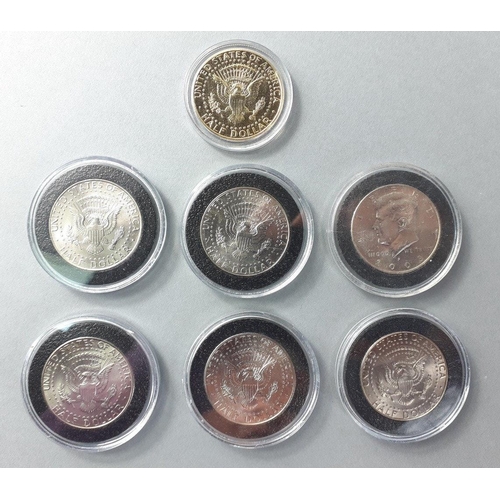 95 - A collection of six US half dollars with colourised religious scenes with one additional Barack Obam... 