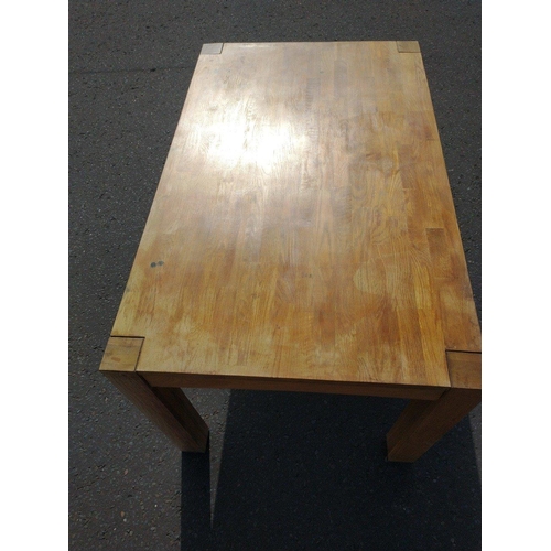 359 - SOLID! A wooden farm house style table in distressed state. Great for a workshop. Approx 150 by 91cm... 