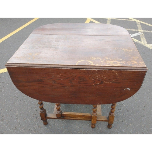 363 - A gateleg table with barley twist legs. In used condition, great addition for a garage. Approx 92cm ... 