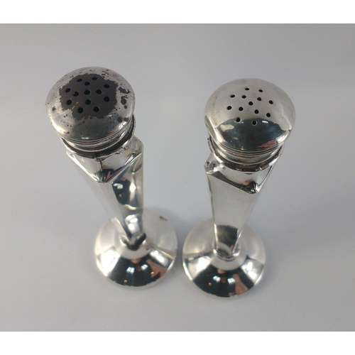 114 - A pair of unusual salt and pepper pots stamped STERLING SILVER 925, each stands 15cm high, gross wei... 