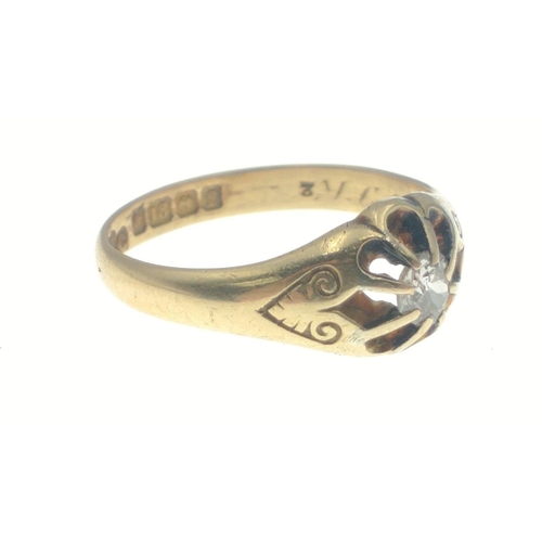 12 - An 18ct stamped yellow gold ring with a solitaire diamond centred - gross weight 4.30g approx - ring... 