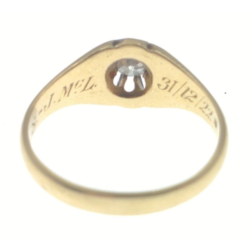 12 - An 18ct stamped yellow gold ring with a solitaire diamond centred - gross weight 4.30g approx - ring... 