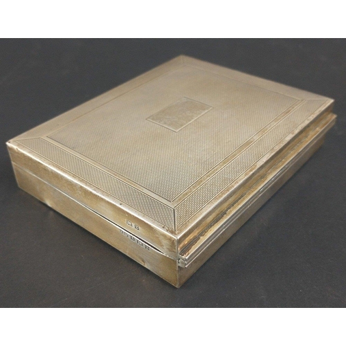 121 - A VINTAGE SILVER cigarette case hallmarked Birmingham 1960 with cedar interior.  Uninscribed cartouc... 