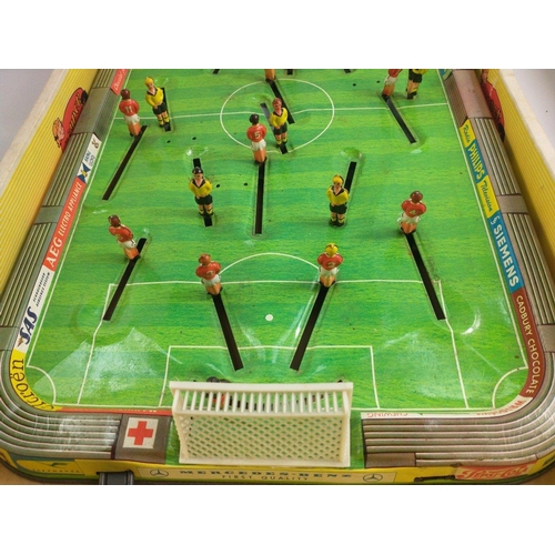 219 - TECHNOFIX Tinplate Table football game. All players and goals present with ball stored beneath.  Two... 