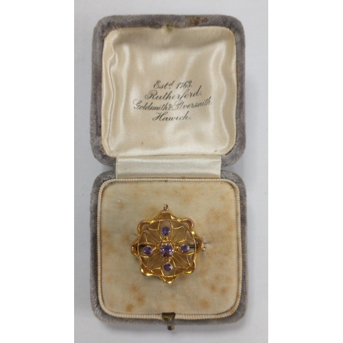 25 - BEAUTIFUL! A Vintage 375 stamped yellow gold pin brooch with a large round cut AMETHYST and 4 suppor... 