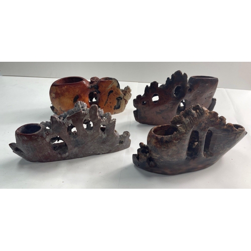 284 - A lovely group of Chinese red soapstone pieces.  Four have intricate floral designs in addition to p... 