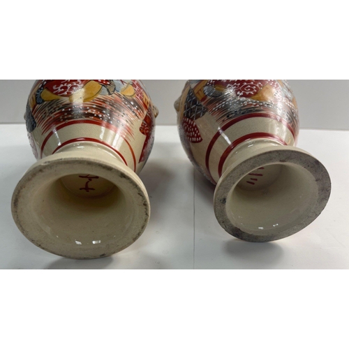 287 - A pair of SATSUMA urn jugs nicely decorated with traditional Oriental gentlemen standing approx 25cm... 