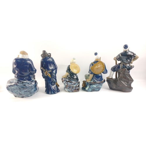 295 - A group of five Chinese mudmen all with vibrant blue colouring to include a lumberjack, and 2 fisher... 